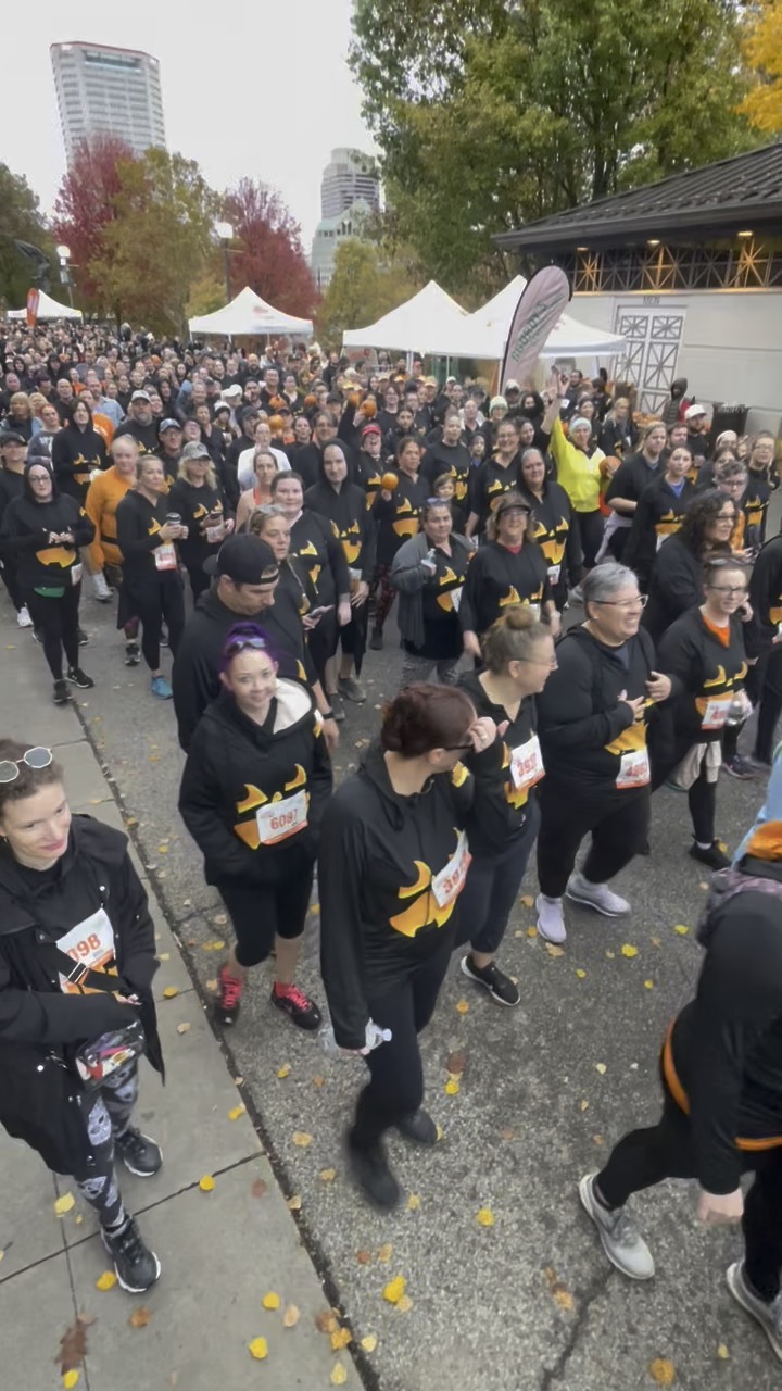 A crowd of runners at the start of a SunState-produced race